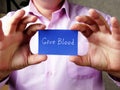 Give Blood phrase on the piece of paper