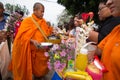 Give food offerings to a Buddhist monk in Morning Royalty Free Stock Photo