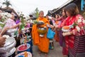 Give food offerings to a Buddhist monk in Morning Royalty Free Stock Photo