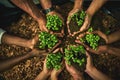 Give green a chance - it might just grow on you. Closeup shot of a group of unidentifiable people holding plants growing