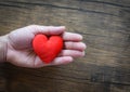 Give Love Man holding red Heart in hands for love Valentines day Donate Help Give love warmth take care concept Royalty Free Stock Photo