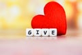 Give love with red heart for donate and philanthropy health care love organ donation family insurance and CSR concept world heart