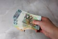 Give, take, banknotes of Belarusian rubles in a hand