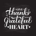 Give thanks with a grateful heart calligraphy hand lettering on chalkboard background. Thanksgiving Day inspirational Royalty Free Stock Photo