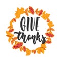 Give thanks - hand drawn latin Thanksgiving Day lettering quote with autumn wreath isolated on the white background. Fun Royalty Free Stock Photo