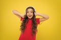 Give in to the groove. Little DJ on yellow background. Cute girl listening to music in DJ headphones. Small child using Royalty Free Stock Photo