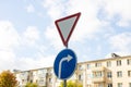 Give way road sign on blue sky background