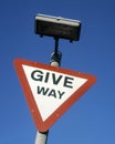 Give way road traffic sign against blue sky Royalty Free Stock Photo