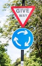 Give way and Roundabout road sign uk Royalty Free Stock Photo