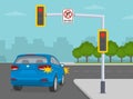 Give way rules at traffic lights. Suv car making the right turn on `no turn on red` sign. Back view. Royalty Free Stock Photo