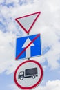 Give way, Yield Sign, the passage is forbidden for trucks, the end of one-way traffic road signs Royalty Free Stock Photo