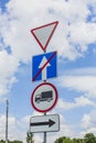 Give way, Yield Sign, the passage is forbidden for trucks, the end of one-way traffic and turn right the road signs Royalty Free Stock Photo