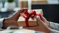 Giving a business gift, hand of two business professionals in a moment of gifting, Generative AI Royalty Free Stock Photo