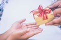 Giving gift box in with hands On special days for special perso Royalty Free Stock Photo