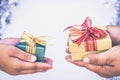 Giving gift box in with hands On special days for special person and copy space background Royalty Free Stock Photo