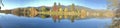 Glorious fall colors reflected on Frenchtown Pond centered