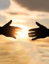 Giving a helping hand. Rescue, helping gesture or hands. The outstretched hands, salvation, help silhouette, concept of Royalty Free Stock Photo