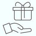 Giving Present thin line icon. Gift box with ribbon vector illustration isolated on white. Present on a hand outline Royalty Free Stock Photo