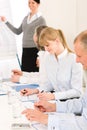 Giving presentation young woman during meeting