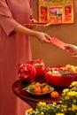 Giving red lucky money envelopes to each other. Asia's customary holiday Royalty Free Stock Photo