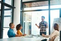 Giving them a little more detail. a young businessman giving a presentation in the boardroom. Royalty Free Stock Photo