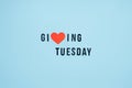 Giving Tuesday, Time to Give, Help, Donation, Support, Volunteer concept with red heart and text Time to Give on blue Royalty Free Stock Photo