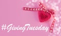 Giving Tuesday website header template. Pink knitted heart on pastel purple background flatlay, creative minimal design Royalty Free Stock Photo