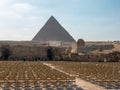 Giza, Cairo, Egypt - September 30, 2021: View of the Sphinx statue and the Egyptian pyramid on the Giza plateau Royalty Free Stock Photo