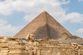 The pyramid of Khufu and the Great Sphinx of Giza, Egypt Royalty Free Stock Photo