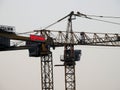 Cranes at a construction site of a new high rise in Egypt new buildings under construction and skyscrapers Royalty Free Stock Photo