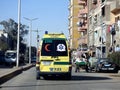 Ambulance on road responding for an emergency call of road accidents, Translation of Arabic text (