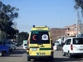 Ambulance on road responding for an emergency call of road accidents, Translation of Arabic text (