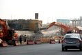 26th of July corridor road development project, removing an old bridge by demolition pliers jaws excavators