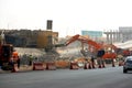 26th of July corridor road development project, removing an old bridge by demolition pliers jaws excavators