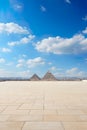 Giza plateau with this stunning view of the extended pavement and the iconic Pyramids of Giza.