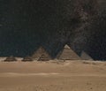 The Giza pyramid complex under night starry sky Royalty Free Stock Photo