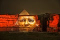 Giza pyramid and Sphinx light up for sound and light show, Cairo, Egypt.