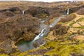 Gjain Canyon landscape with small waterfalls and lush vegetation, Thjorsardalur valley, Iceland, spring Royalty Free Stock Photo