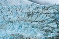 Glacial blues and dirt browns in fractured ice patterns on glacier in Drygalski Fjord, South Georgia, as a nature background