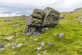 A glacial erratic deposited on limestones base on the southern slopes of Ingleborough, Yorkshire, UK Royalty Free Stock Photo