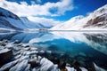 glacial lake with thick ice and snow on the shore Royalty Free Stock Photo