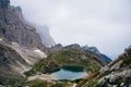 Glacial lake on top of the mountain landscape. Coldai lake, Belluno, Italy Dolomites panoramic view