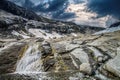 A glacial river beneath the melting glacier