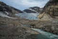 A glacial river beneath the melting glacier