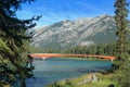 Banff National Park with Pedestrian Bridge over Glacial Bow River, Canadian Rocky Mountains, Alberta Royalty Free Stock Photo