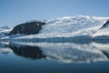 Glacier in Antarctic mountainous landscape,