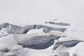 Glacier crevasses and seracs in a snow field in the Mont Blanc a