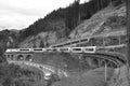 The glacier Express train is driving across the swiss alps and through the Unesco World heritage from Zermatt to St. Moritz