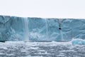 A glacier with floating sea ice north of Svalbard in the Arctic, with water falls Royalty Free Stock Photo