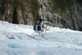 The Glacier Helicopter Flight: Board the helicopter for the scenic flight to Franz Josef Glacier. Royalty Free Stock Photo